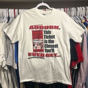 Vintage 2000 Alabama vs
Auburn Iron Bowl T-Shirt First Time in Tuscaloosa
